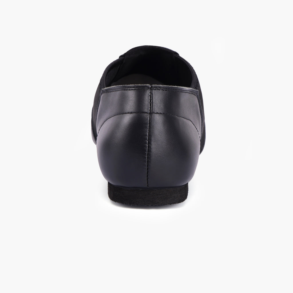 Back view of Linodes black adult jazz shoes with low heel and secure fit