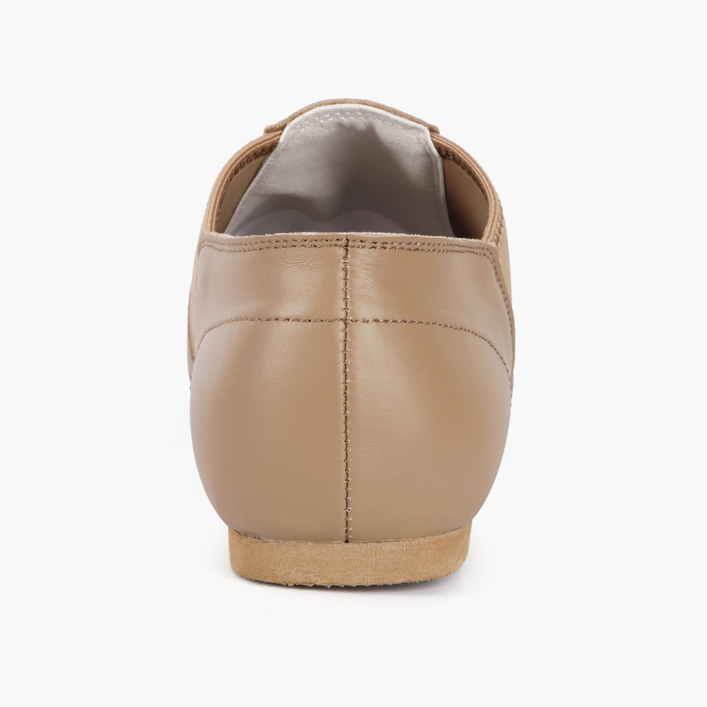 Back view of Linodes tan adult jazz shoes with low heel