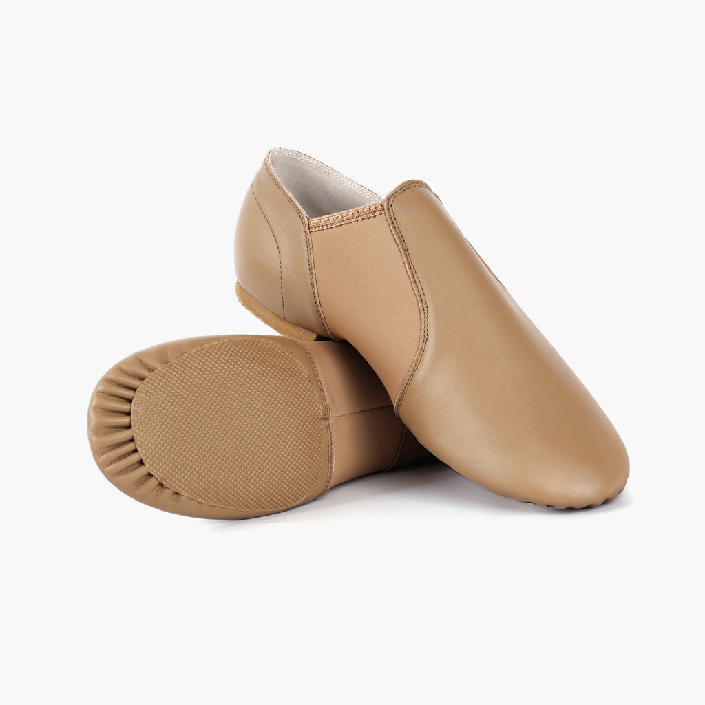 Pair of Linodes adult tan slip-on jazz shoes with neoprene arch support
