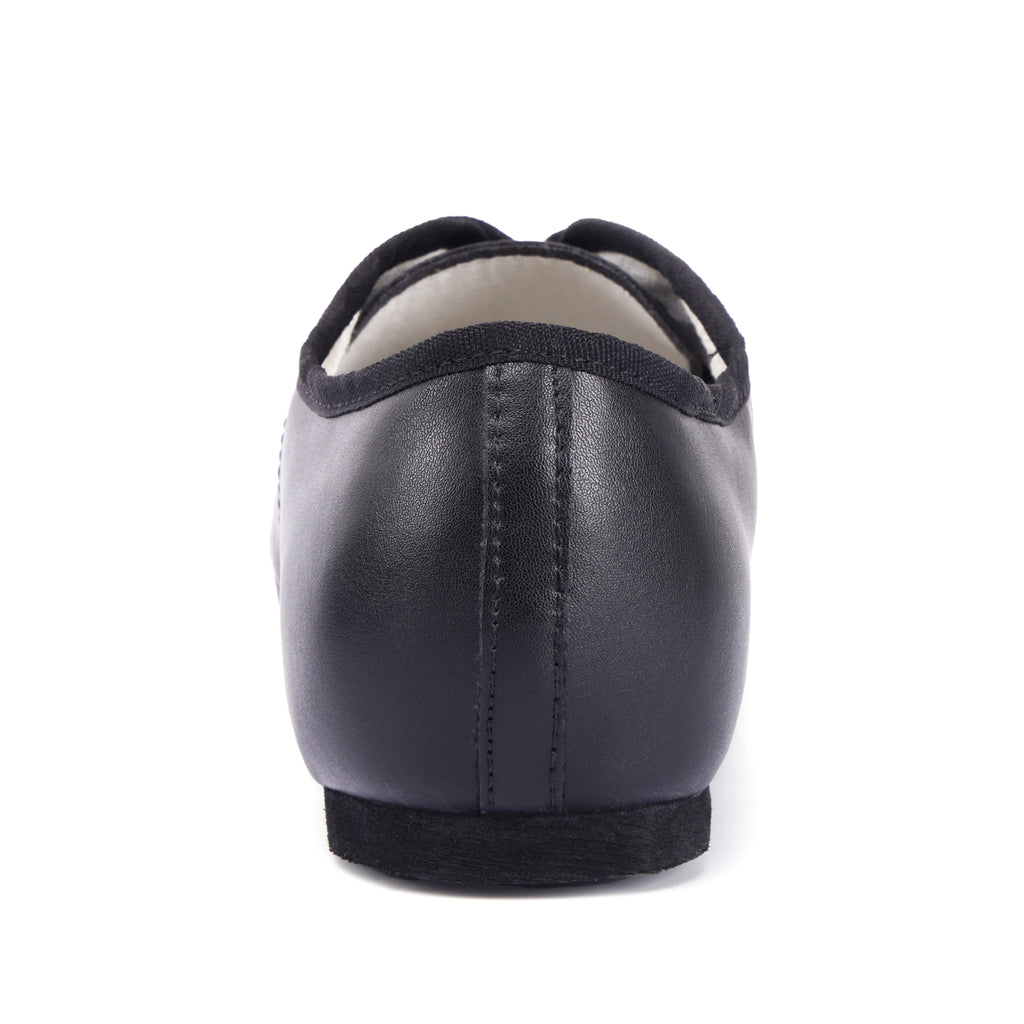 Back view of Linodes black PU leather jazz shoes with low heel